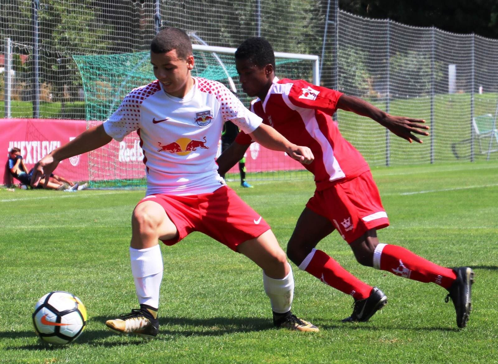 Youth players in action at a football tournament