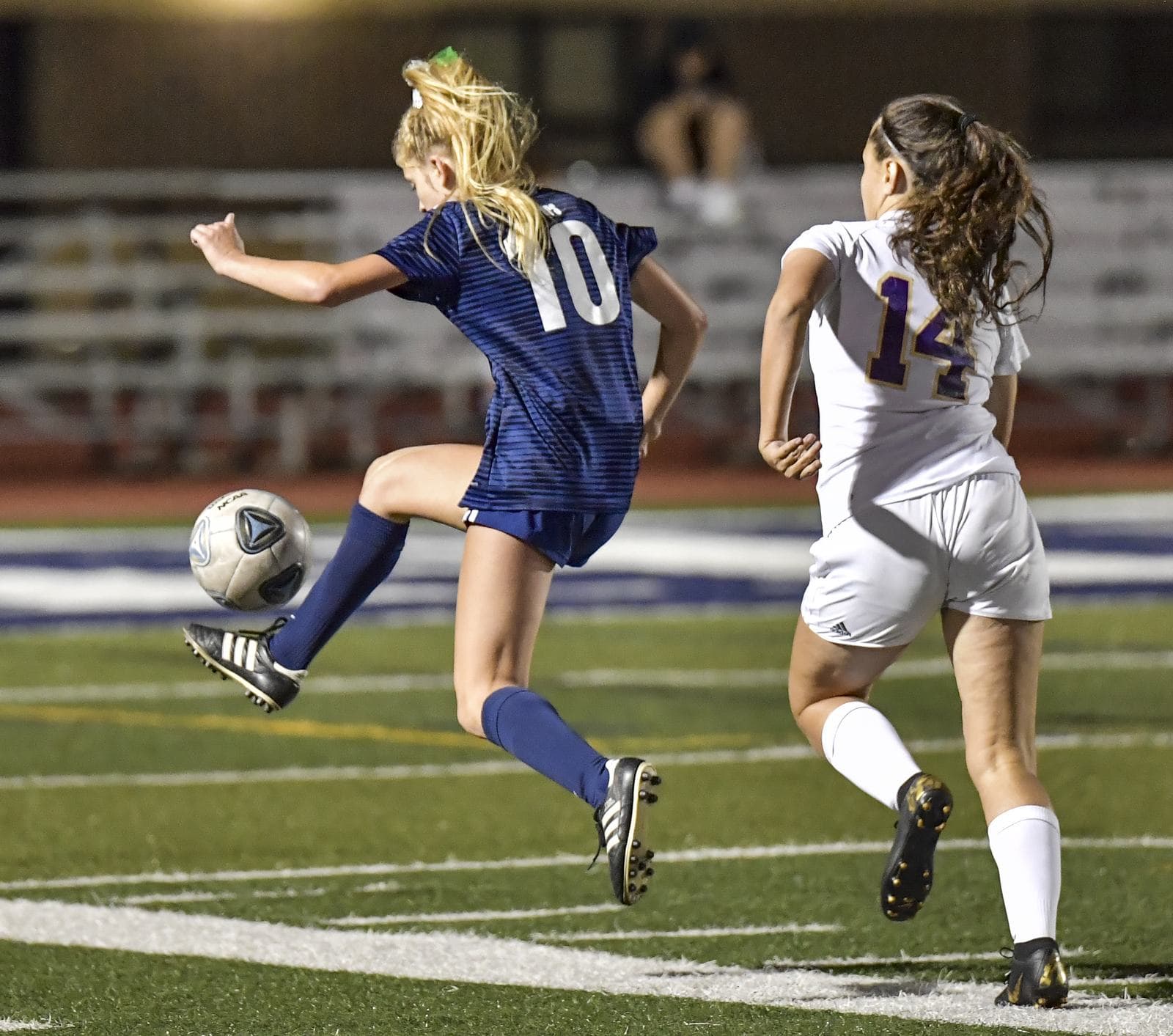 Girls high school soccer match action