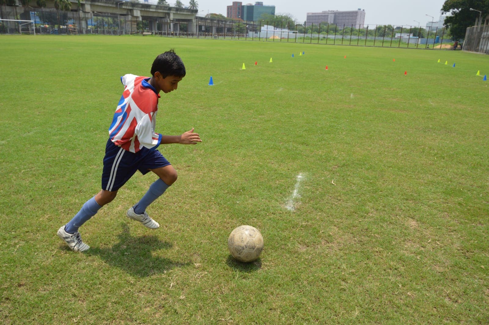 Youth football dribble test in Kolkata — ball in action