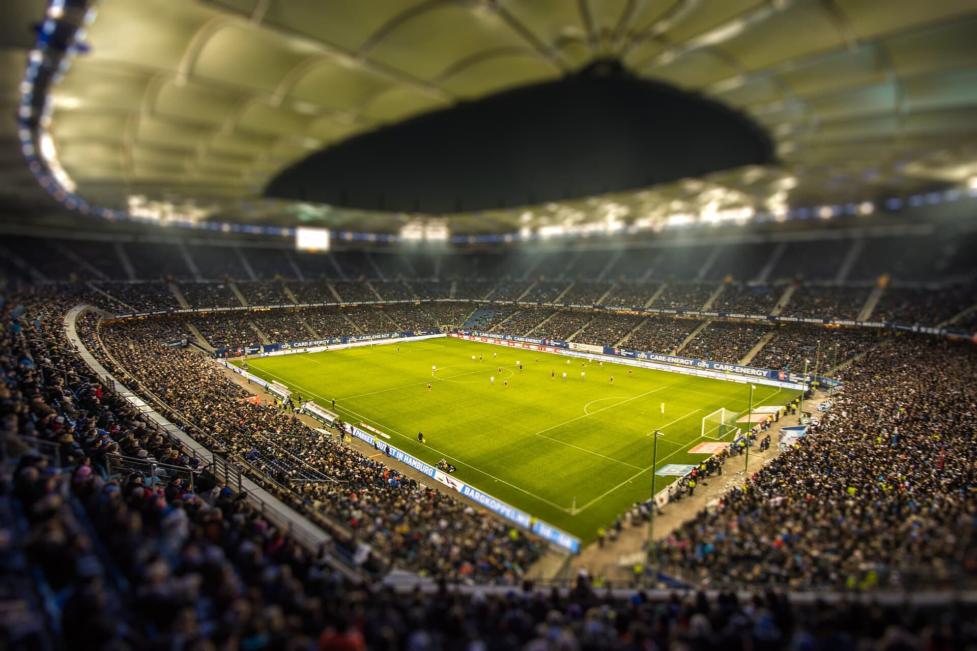 Volksparkstadion Hamburg at night (illustrative)