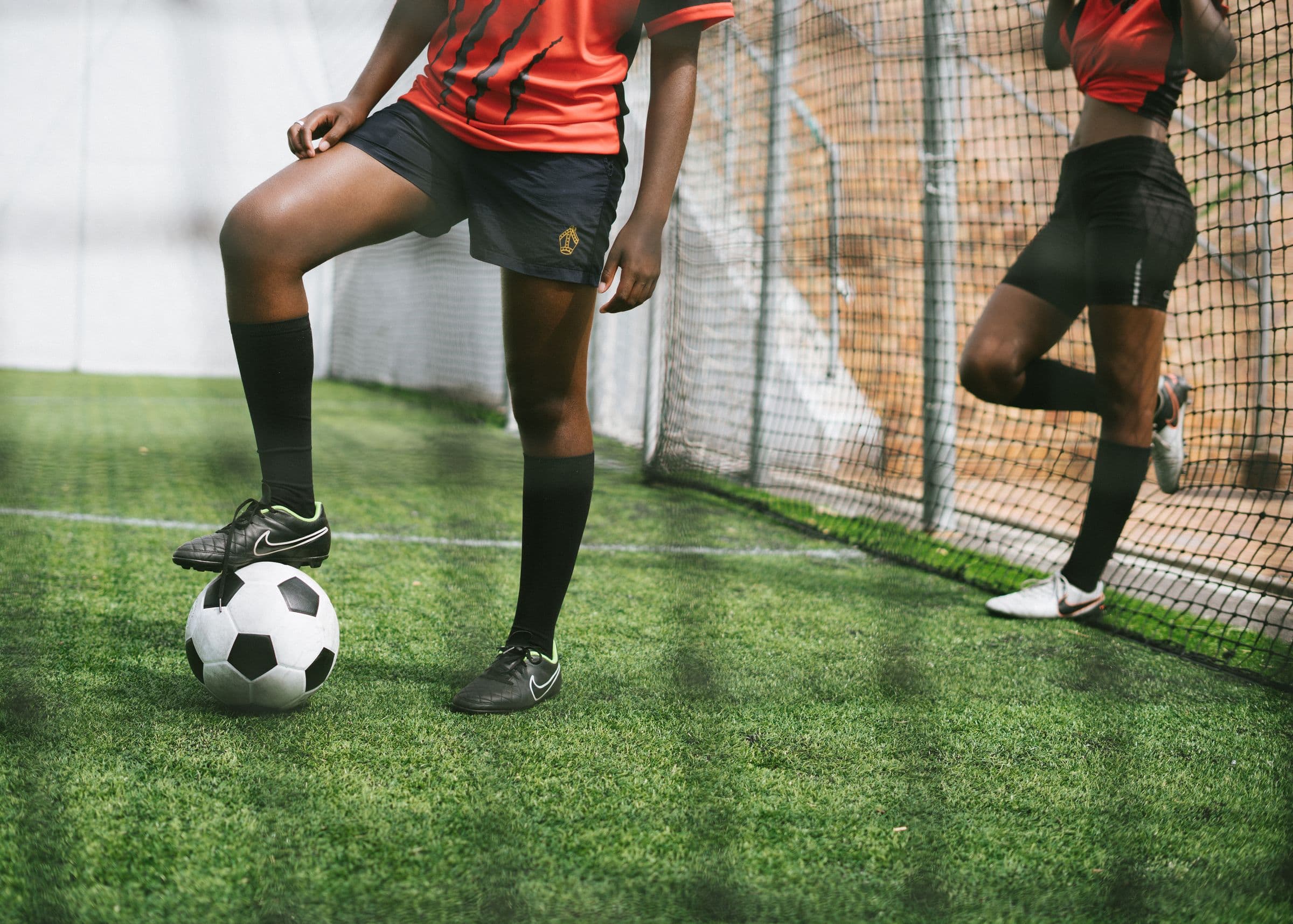 Girls football training on a pitch