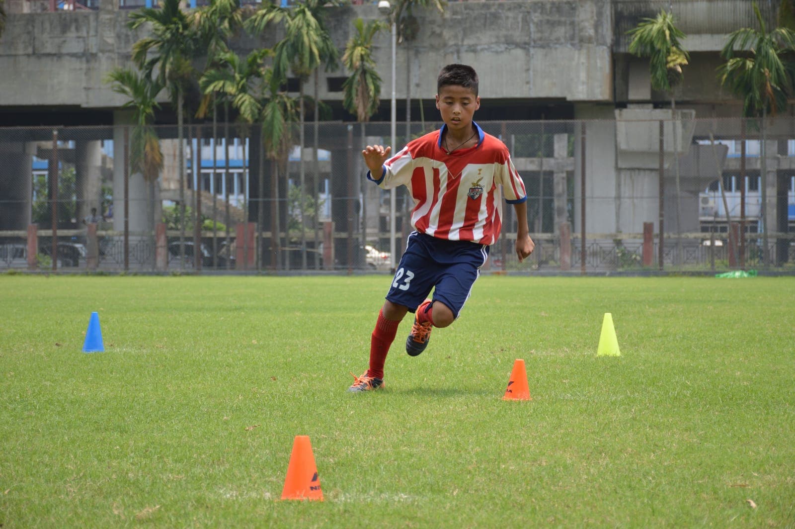Youth football training in Kolkata — dribbling/agility with ball