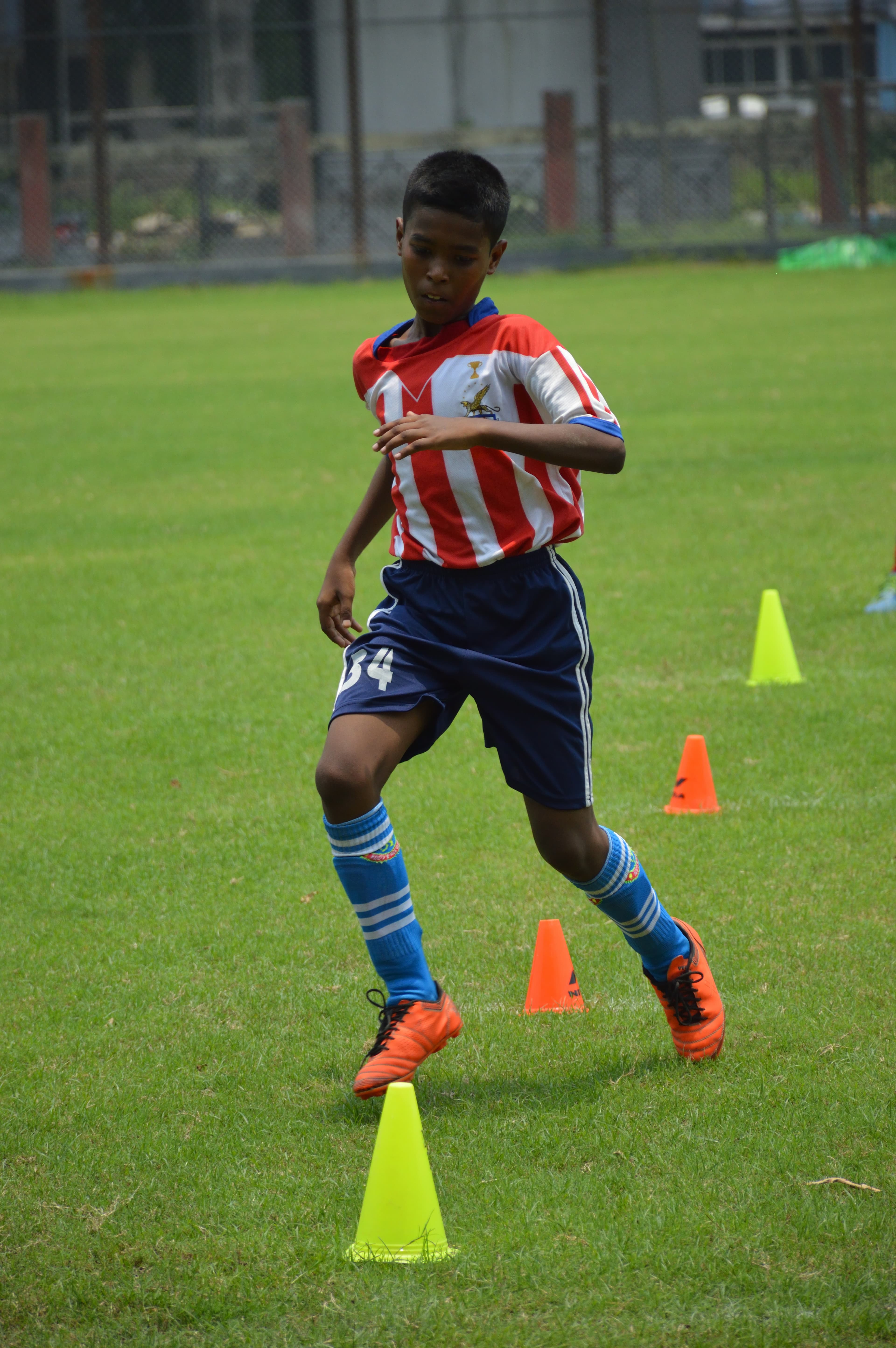 Youth football agility drill in Kolkata