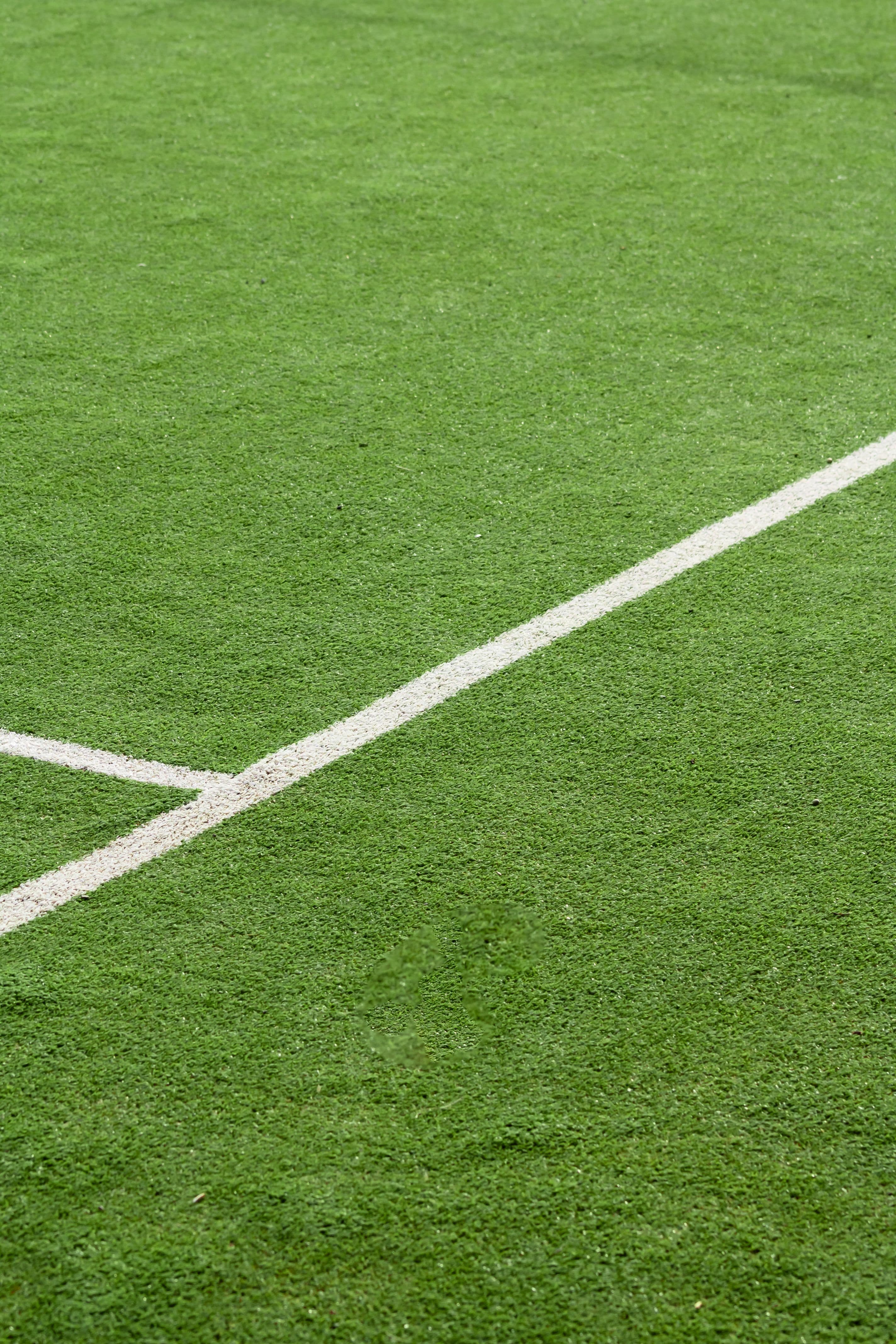 Football pitch with crisp white lines