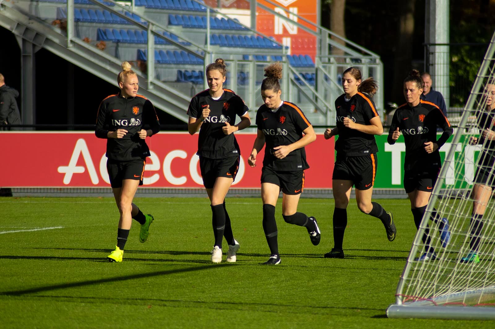 Women’s national team players training on field