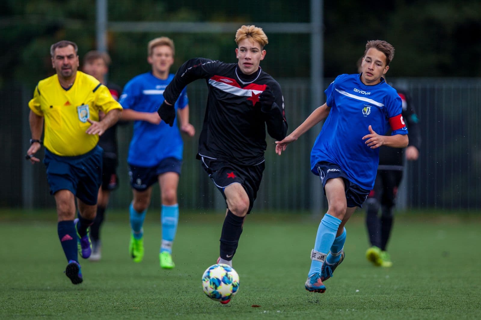 Youth footballers contesting the ball in Orlová