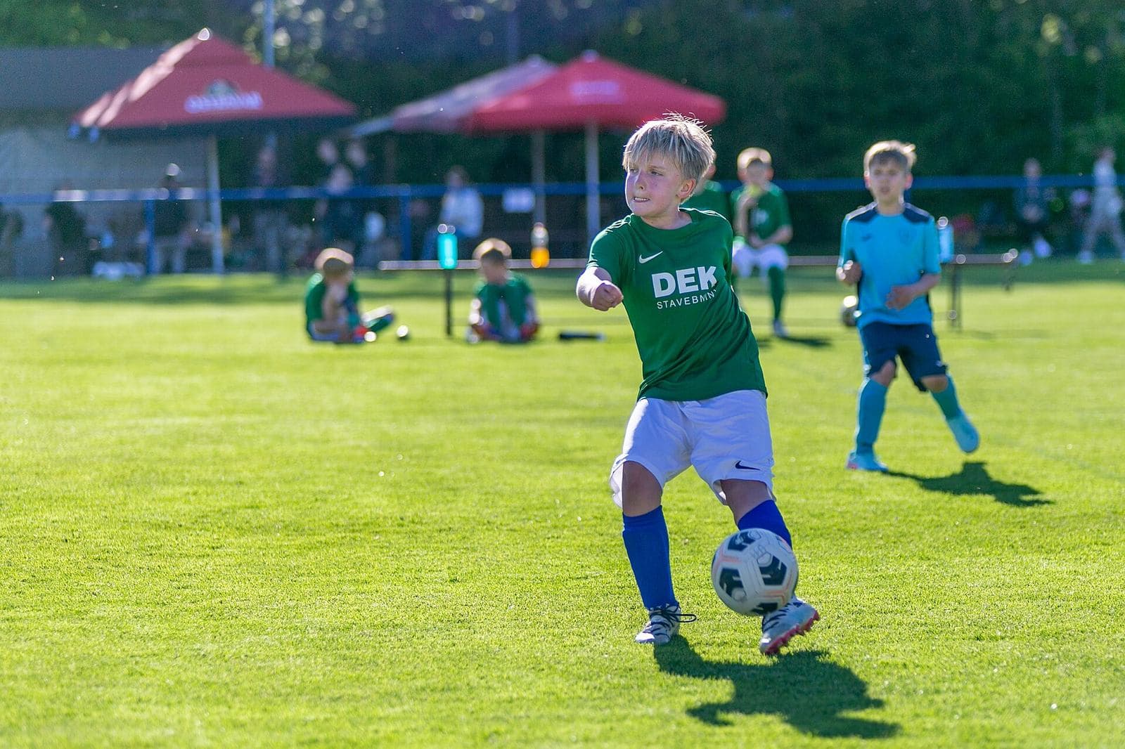 Youth footballers contesting the ball
