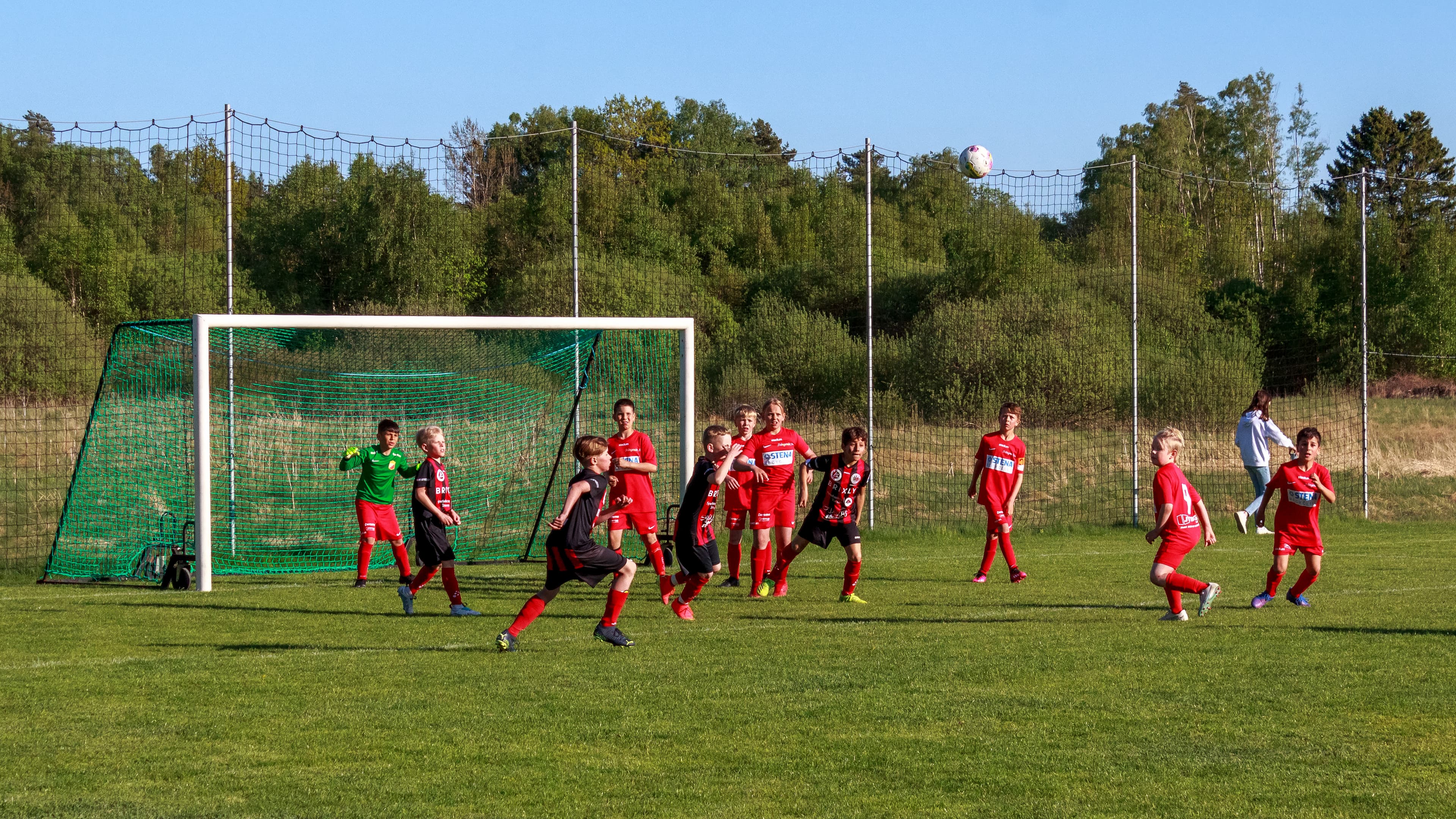 Youth football match — players with ball