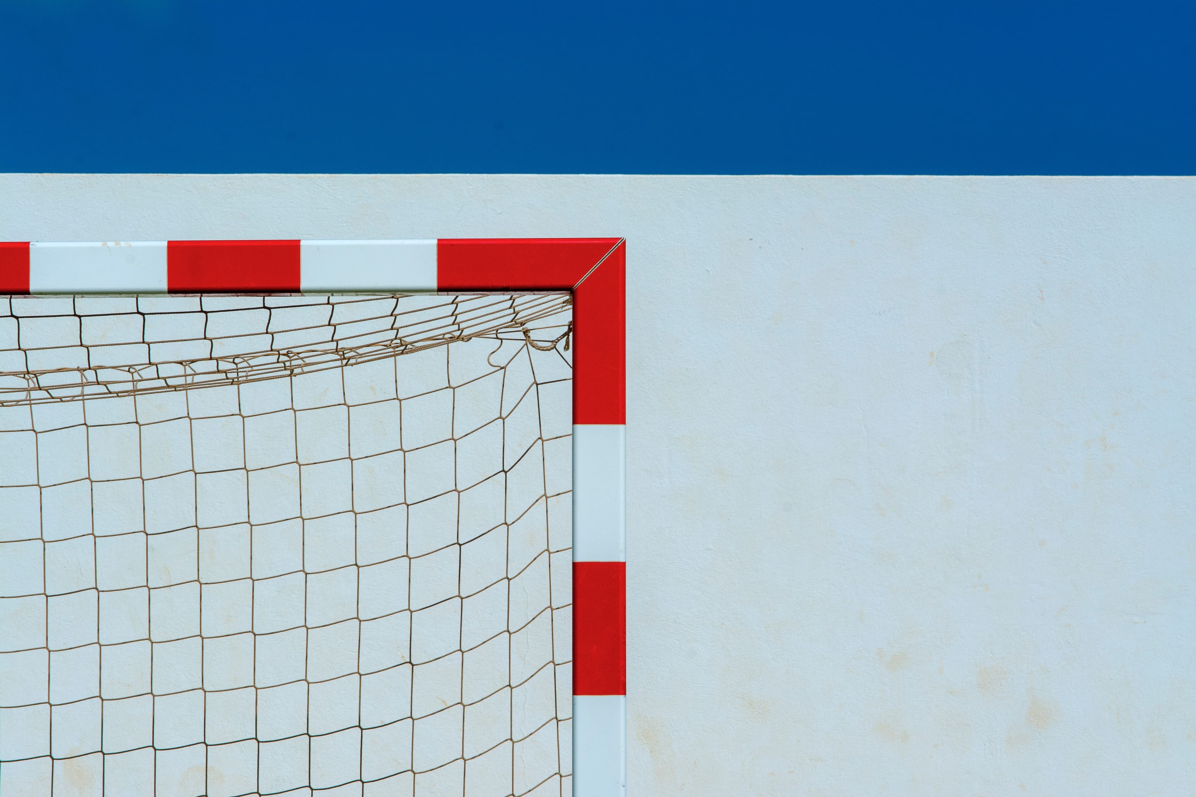 Minimal soccer goal against clear sky
